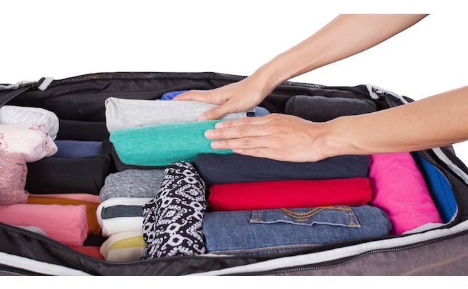 Rolled Clothes in Suitcase Style Hack for Packing